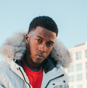 a man in a white jacket